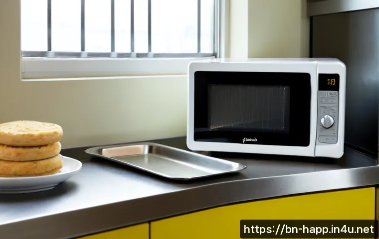Home 17 소형 전자레인지 추천 - Photorealistic compact countertop microwave in a bright, tidy small apartment kitchen, stainless ste...